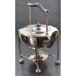 A silver plated spirit kettle on stand, having a yoke-form handle with elongated tubular supports,