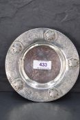 An Arts & Crafts silver dish by Liberty & Co, probably designed by Bernard Cuzner, having five