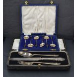 A George V cased silver three-piece christening set, comprising knife, fork and spoon, each