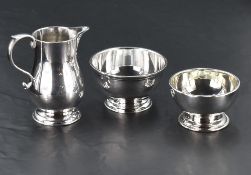 A small silver cream jug and sugar bowl of plain form, Sheffield 1969, Roberts & Belk, approx 176g