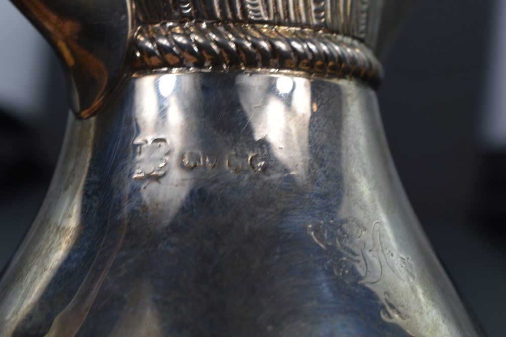 A Victorian silver hot water pot of baluster form having gadrooned decoration, engraved - Image 2 of 3