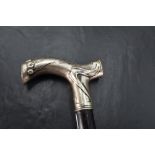 A German 800 grade white metal mounted walking stick, of Art Nouveau design , the handle marked '.