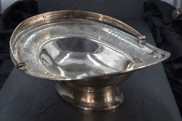 A Georgian silver table basket having leaf and scallop shell etched decoration and swing handle,
