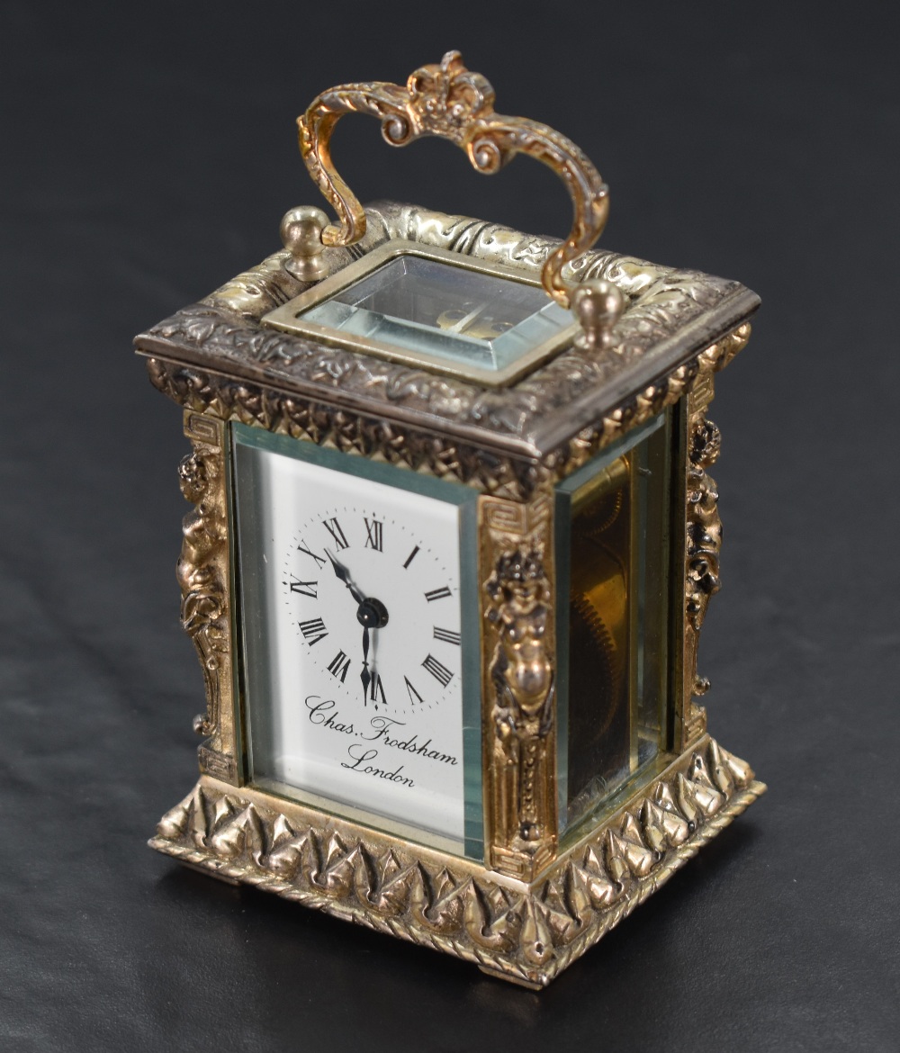 A Limited Edition miniature silver carriage clock by Charles Frodsham commemorating the Queen's