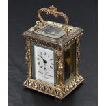 A Limited Edition miniature silver carriage clock by Charles Frodsham commemorating the Queen's