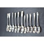 A set of six Victorian silver teaspoons of fiddle back form bearing monogram to terminals, London