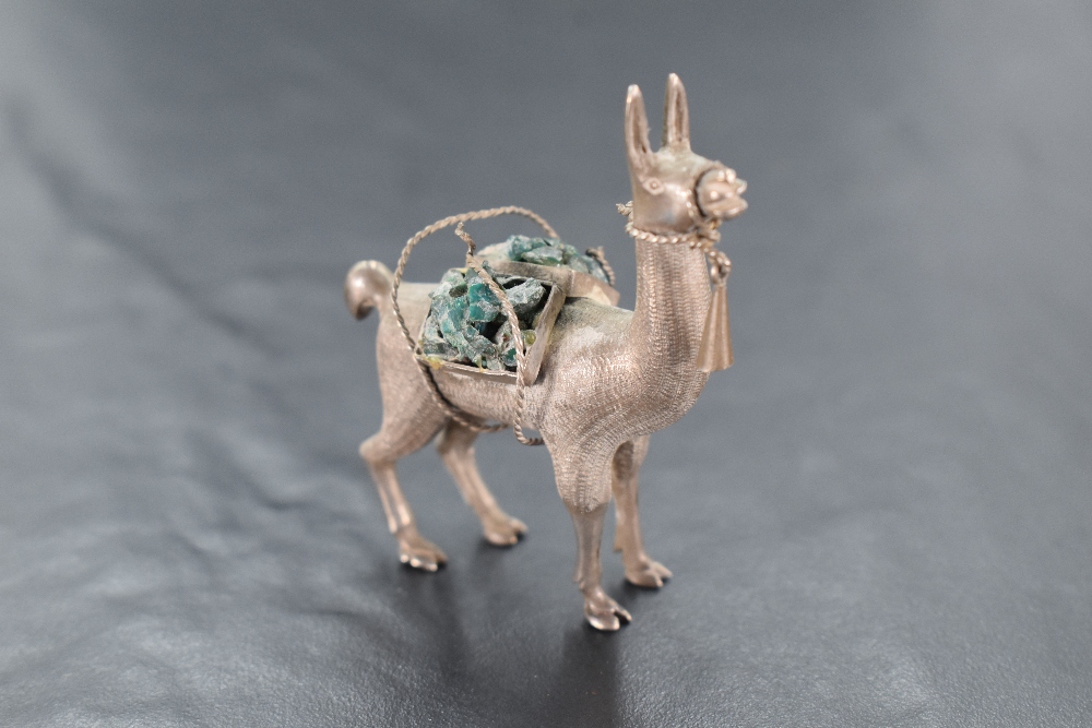 A small white metal model of a Llama, no marks tests as silver, approx 56mm & 40.8g