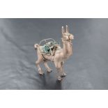 A small white metal model of a Llama, no marks tests as silver, approx 56mm & 40.8g