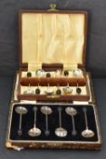 Two cased sets of silver coffee bean spoons, of traditional form, gross weight 70grams.