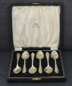 A cased set of six silver egg spoons having moulded detail to terminals, Sheffield 1945, G W