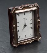 An Elizabeth II silver mounted and stained wood quartz-movement desk clock, the dial marked R.