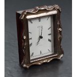 An Elizabeth II silver mounted and stained wood quartz-movement desk clock, the dial marked R.