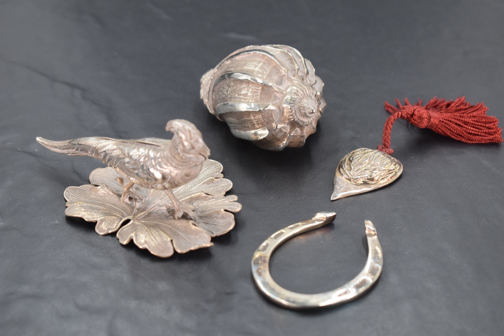 Four HM silver and white metal trinkets including lucky horseshoe, pheasant study, conche shell - Image 2 of 2