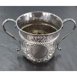 An early 20th century Britannia silver replica Queen Anne porringer, marked for London, 1910,