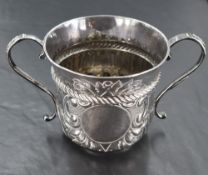 An early 20th century Britannia silver replica Queen Anne porringer, marked for London, 1910,