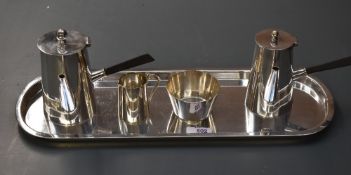 A silver-plated five piece bachelors coffee set, comprising coffee pot, hot water pot sugar, cream