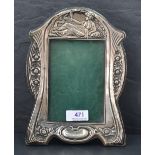 An Edwardian silver photograph frame of Art Nouveau design having leather easel back, Birmingham