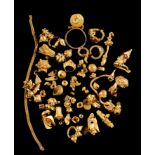AN EXTENSIVE COLLECTION OF GOLD JEWELLERY FRAGMENTS, SOUTH-EAST ASIA, MOSTLY JAVA, 14TH CENTURY AND