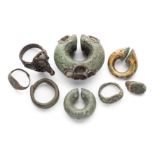 EIGHT BRONZE RINGS, JAVA AND CAMBODIA, 9TH-12TH CENTURIES