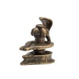 A SMALL BRONZE FIVE-FACED YONI LINGAM (PANCHAMUKHALINGA), NORTHERN INDIA, 18TH / 19TH CENTURY