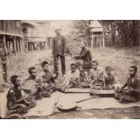 * A PHOTOGRAPH DEPICTING A CAMBODIAN MUSICAL ENSEMBLE, 19TH CENTURY