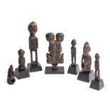 A GROUP OF DAYAK CARVINGS, BORNEO, CIRCA 19TH CENTURY