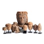 NINE JAVANESE TERRACOTTA HEADS, 12TH-14TH CENTURIES