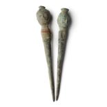 TWO BRONZE HAIRPINS, JAVA, INDONESIA, CIRCA 14TH CENTURY