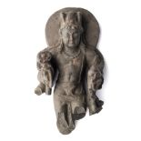 A GREY SCHIST FRAGMENTARY FIGURE OF SIVA, KASHMIR, 8TH / 9TH CENTURY