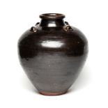 A CHINESE LARGE BROWN GLAZED JAR, PROBABLY MING DYNASTY