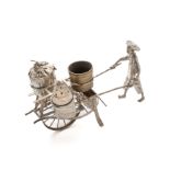 A CHINESE SILVER 'DRAGON' CIGAR LIGHTER AND A CONDIMENT 'CART', WANG HING & CO., HONG KONG, CANTON O