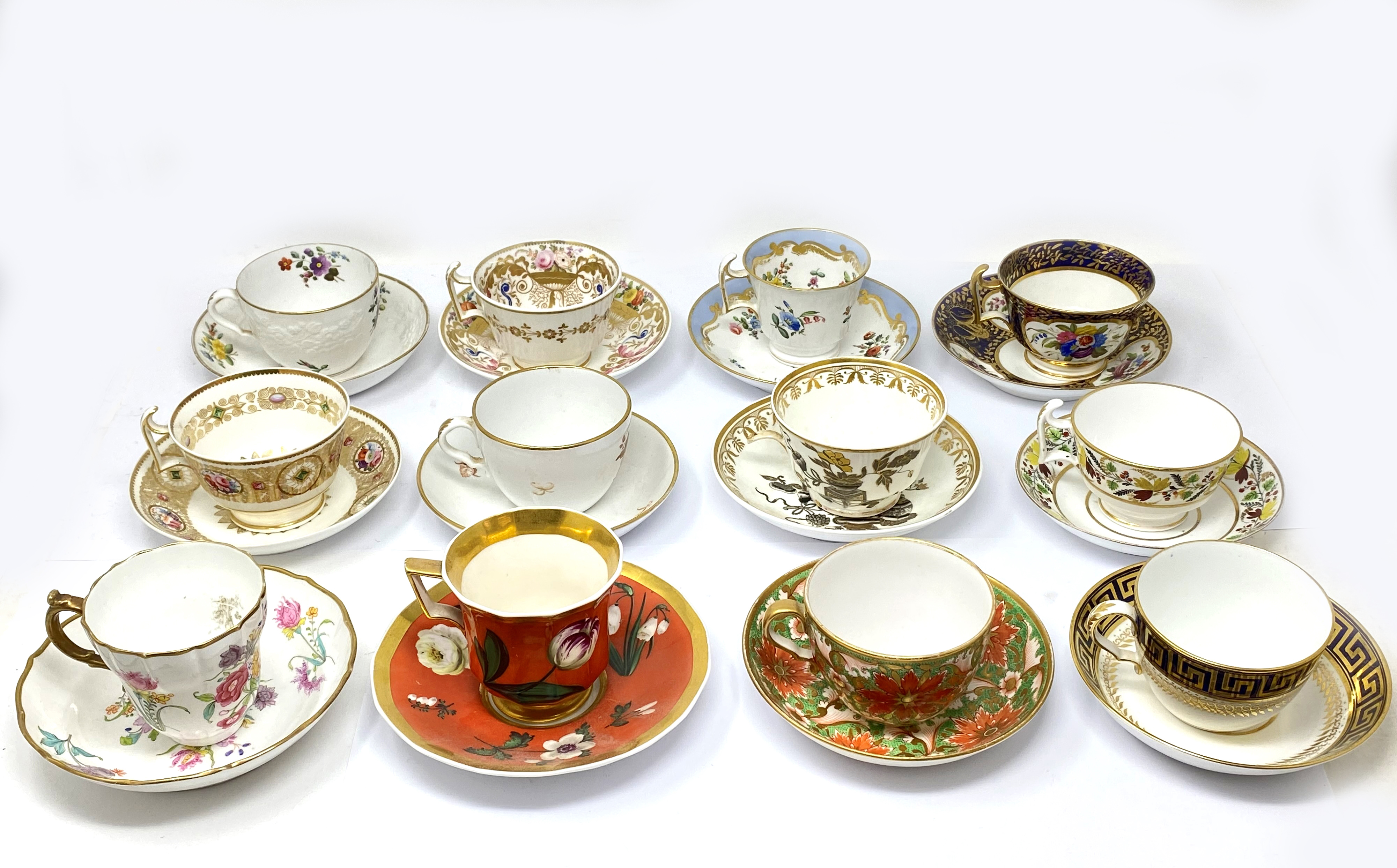 A GROUP OF TWELVE SPODE CUPS AND SAUCERS, EARLY 19TH CENTURY