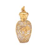 A VICTORIAN GOLD CAGE-WORK COVERED SCENT BOTTLE, LONDON, CIRCA 1875