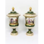 □ A PAIR OF CONTINENTAL PORCELAIN VASES AND COVERS, RUSSIAN STYLE, CIRCA 1900