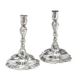 A PAIR OF GERMAN SILVER CANDLESTICKS, JOHANN BALTHASAR HECKENAUER, AUGSBURG, 1759-61