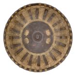 AN EAST AFRICAN IRON CIRCULAR SHIELD, LATE 19TH CENTURY