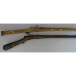 A 32 BORE INDIAN DECORATED MATCHLOCK MUSKET, 20TH CENTURY AND A 14 BORE INDIAN MATCHLOCK MUSKET (TOR