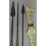 FOUR AFRICAN SPEARS, A SADDLE BAG, AND TWO SWORDS FOR THE TOURIST MARKET, 19TH AND 20TH CENTURY