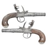 A PAIR OF 50 BORE ENGLISH SILVER-MOUNTED FLINTLOCK POCKET PISTOLS SIGNED PERRY, LONDON, PRIVATE PROO