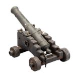 A MINIATURE BRONZE NAVAL CANNON, LONDON PROOF MARKS, LATE 18TH CENTURY