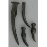 FOUR EAST EUROPEAN WAR HAMMER HEADS, 18TH AND 19TH CENTURIES