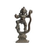 A SMALL BRONZE FIGURE OF KRISHNA KALIYADAMANA