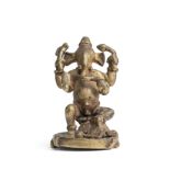 A BRONZE FIGURE OF GANESHA