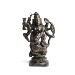 A BRONZE FIGURE OF DURGA MAHISASURAMARDINI