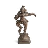 A BRONZE FIGURE OF KRISHNA