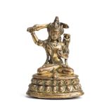 A SMALL GILT BRONZE FIGURE OF MANJUSRI