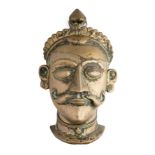 A BRASS SIVA MASK