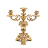 A GILT-BRONZE THREE-LIGHT CANDELABRUM