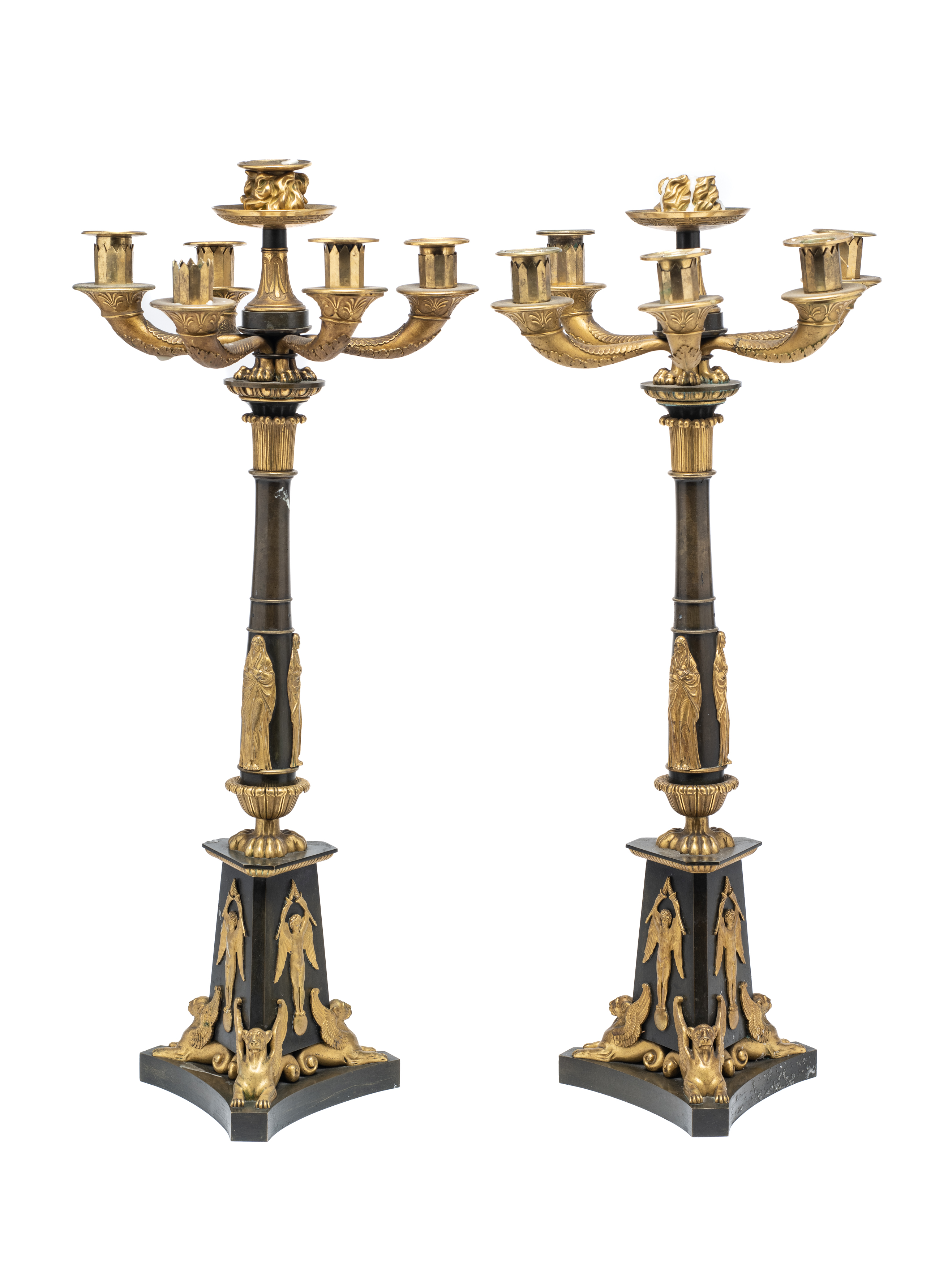 A PAIR OF FRENCH EMPIRE ORMOLU AND PATINATED BRONZE CANDELABRA