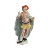 A PORCELAIN FIGURE OF 'JODELET ' FROM THE COMMEDIA DELL 'ARTE